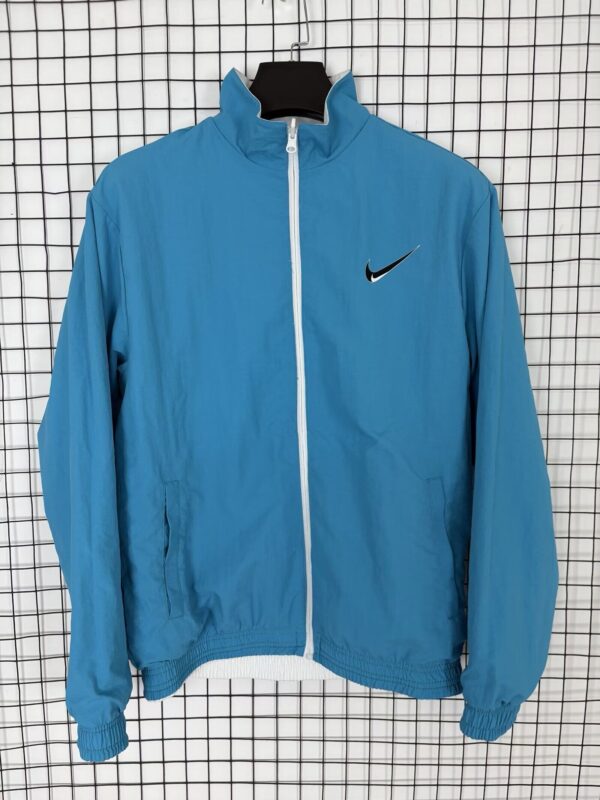 Nike / Cortavientos Reversible Azul x Blanco